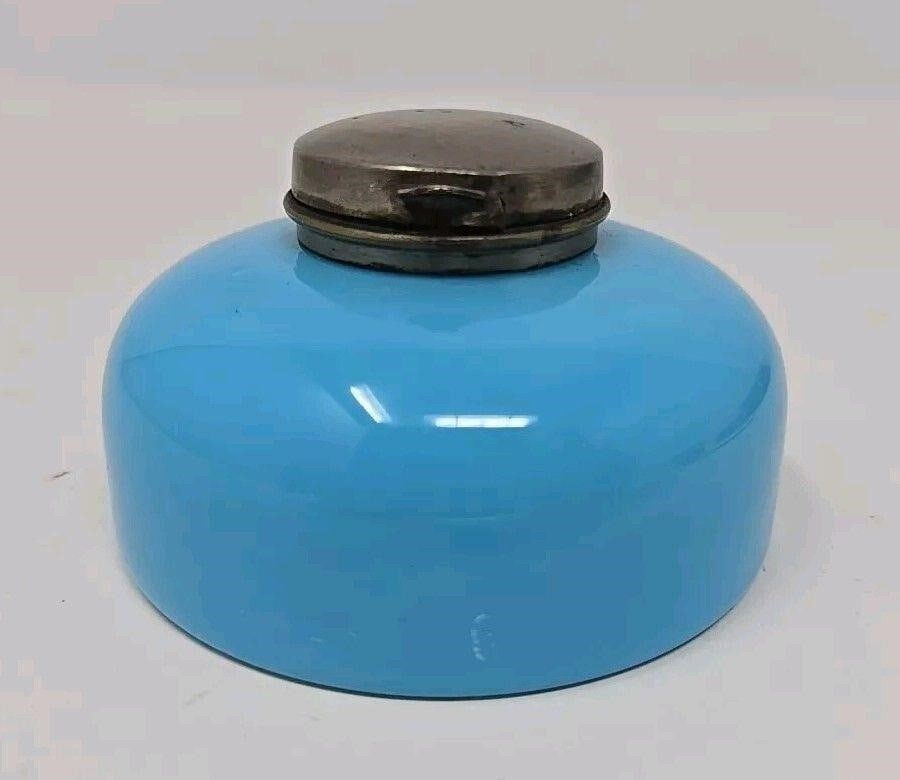 Antique French Blue Opaline Glass Inkwell: Robins egg blue opaline French inkwell from the 2nd half of 19th century. Measures 2 3/4 inches wide and 1 3/4 inches tall. There is a scratch on one side and a tear in the silver top. Please see the