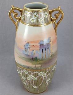 Nippon Morimura Hand Painted Roman Ruins Vase: Antique Japanese porcelain vase. Decorated with hand painted Roman ruins. With hand painted white flowers and raised enamel flowers with pink and gold stems over an olive green and gold background. Go