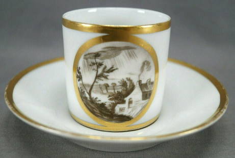 La Courtille Landscape Cup & Saucer 1773-1824 A: Nice porcelain coffee can/cup and saucer. The cup is decorated with a hand painted scene of a cottage, trees, and clouds with rain framed in gold gilding. With gold gilding along the rim. The saucer h