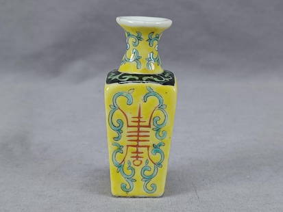 Chinese Export Famille Jaune Miniature Vase: Nice antique Chinese Export porcelain Famille Jaune miniature vase. Decorated with hand painted pink, white, green, and blue floral scrollwork on two sides and red Chinese symbols wtih blue scrollwork