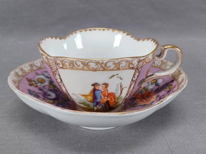 Dresden Watteau Scene Pink Gold Tea Cup & Saucer B: Nice antique German porcelain quatrefoil shaped tea cup and saucer. Decorated in alternating panels with hand painted Dresden flowers over pink and scenes with hand painted Watteau scenes / courting