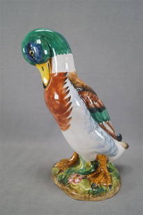 Ugo Zaccagnini Italian Majolica Duck Figurine: Nice vintage hand painted Italian majolica pottery mallard duck figurine. Signed on the bottom by Ugo Zaccagnini. Circa 1937 to 1950s.Has one glaze flake to the side of the base, and some minor glaze