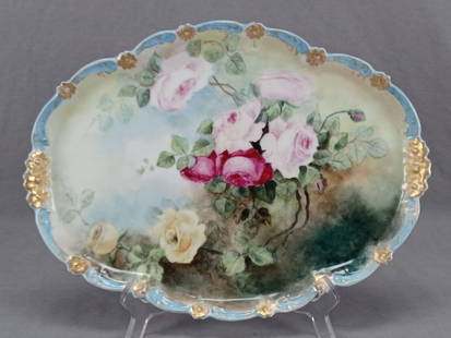 Antique Hand Painted Roses Blue Gold Dresser Tray: Antique late 19th / early 20th century porcelain tray with relief molded rose and scrollwork edge decorated in blue and gold. Hand painted with dark pink, light pink, and yellow roses over a blue,