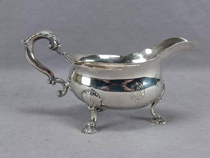 Sterling Baronet of Chicksands Priory Sauce Boat: Antique 18th century Georgian period British London Rococo style Sterling Silver sauce boat. Engraved armorial crest of the 4th Baronet of Chicksands Priory Sir George Osborn. Hallmarks for London, st