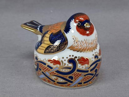 Royal Crown Derby Goldfinch Figurine C. 1997: Nice vintage bone china figurine of a Goldfinch Nesting. Decorated in the Imari style in cobalt, red, orange, and blue. Marked on the bottom Royal Crown Derby English Bone China Goldfinch Nesting