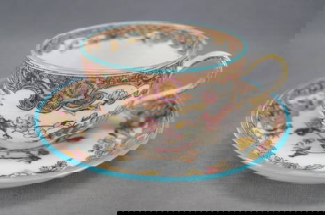 George Jones Kio Pattern Tea Cup & Saucer: Nice antique bone china tea cup and saucer. Decorated in the Kio pattern with hand colored pink and yellow flowers and turquoise enamel. The saucer is marked on the reverse with a crown over Anglo GJ
