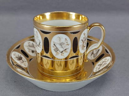 Old Paris Symbols of the Arts Coffee Cup & Saucer: Nice antique Old Paris / Vieux Paris French porcelain coffee cup or coffee can and saucer. Decorated with hand painted symbols of the arts in white ovals alternating with black ovals over a gold backg