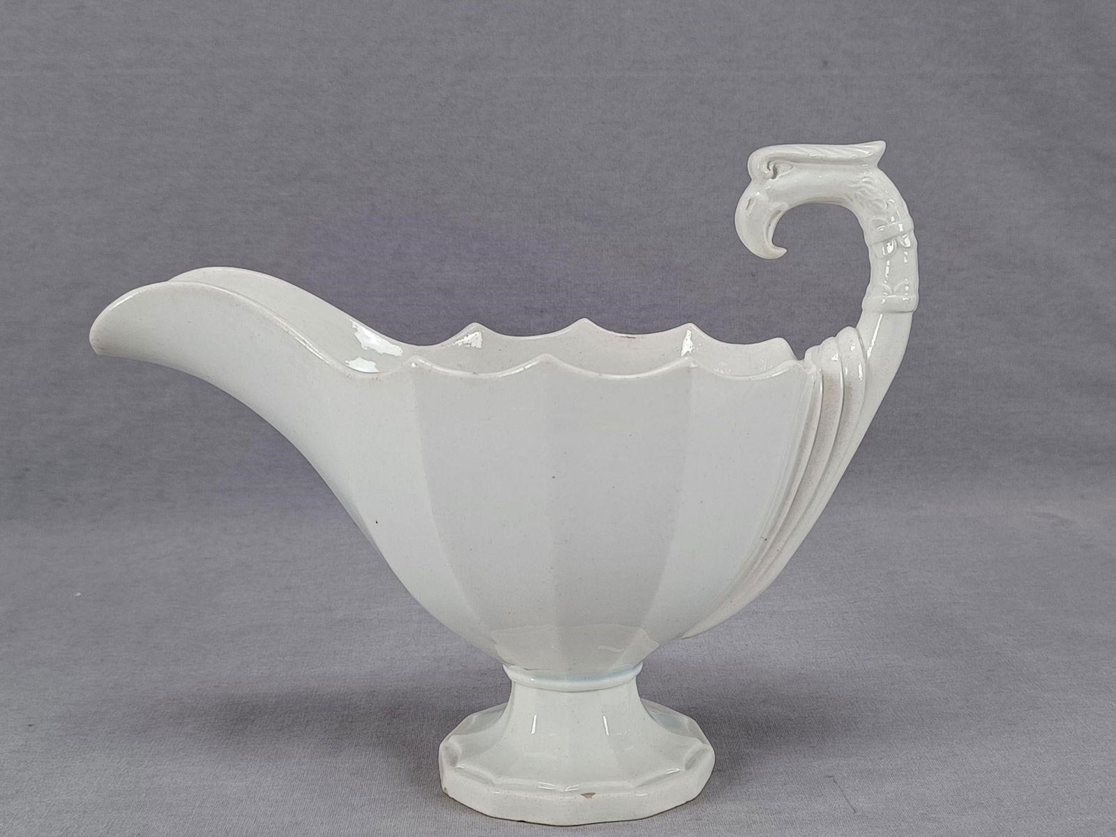 D Johnson & Cie Bordeaux Gravy Boat C. 1834-1845: Rare antique French pearlware gravy boat with griffin head handle. Marked on the bottom D Johnson & Cie Porcelaine on the bottom in blue. Produced by David Johnson & Cie in Bordeaux, France between 18