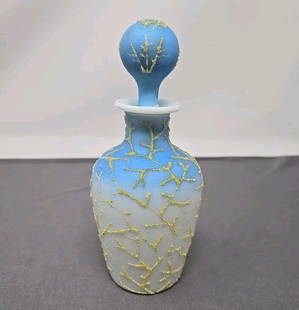 Bohemian Blue White Coralene Glass Perfume Bottle: Victorian blue fading to white Coralene perfume bottle. Probably produced by either Harrach or Carl Goldberg. This is a hand blown satin glass piece with a rough pontil mark on the bottom. Circa late