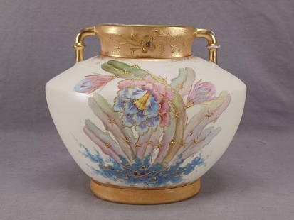 Antique Royal Bonn Hand Painted Floral Vase: Nice antique German faience pottery vase. Decorated with hand painted blue, purple, pink and yellow flowers with raised gold highlights over an ivory background with clouded gold gilding. Has raised g