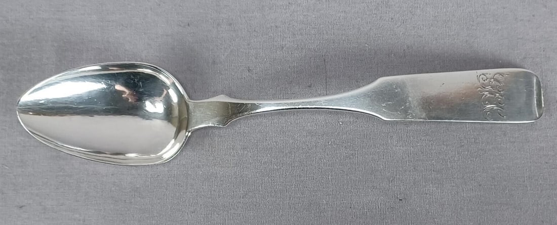 Andrew Ellicott Warner Baltimore Coin Silver Spoon: Antique American coin silver spoon. Engraved with a scripted monogram GEC on the handle. Marked on the back of the handle A.E. Warner. Made by Andrew Ellicott Warner, Baltimore Maryland between 1813 a