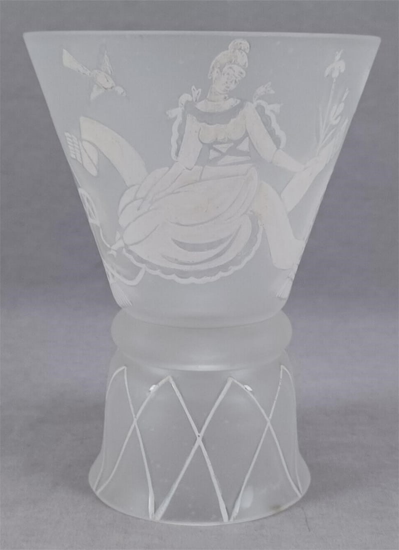Josef Hoffman Wiener Werkstatte Glass Goblet: Nice antique frosted glass goblet designed by Josef Hoffman for Wiener Werkstatte. Decorated with lady on a ribbon with flowers in a raised white enamel. Signed on the inside of the of the bottom WW.