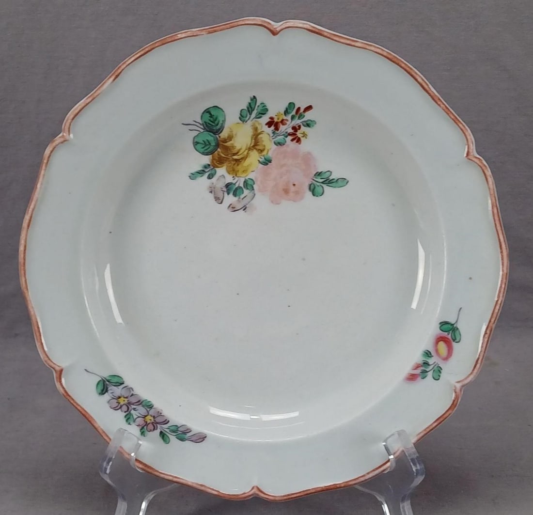 18th Century Spanish Alcora Floral 8 7/8" Plate A: Antique 18th century Spanish porcelain plate. Decorated with hand painted flowers in pink, yellow, red, and purple. Pink trim along the edge. Has a hand painted black A mark on the reverse used by Alc