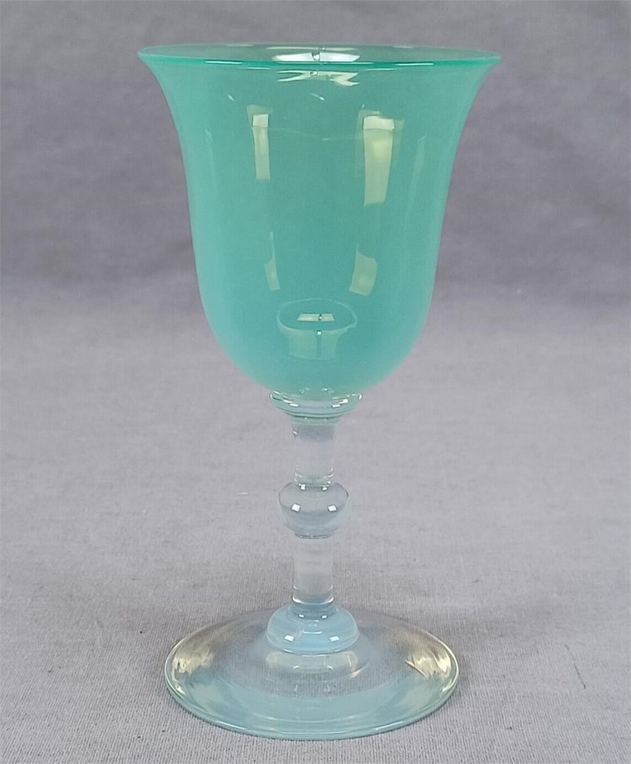 Dorflinger Green Opalescent Opal Glass Wine Glass: Nice antique hand blown opalescent green wine glass. Ground and polished pontiled base. Not signed. Produced by Dorflinger. The photo I've seen of the Dorflinger opal glassware line is in black and wh