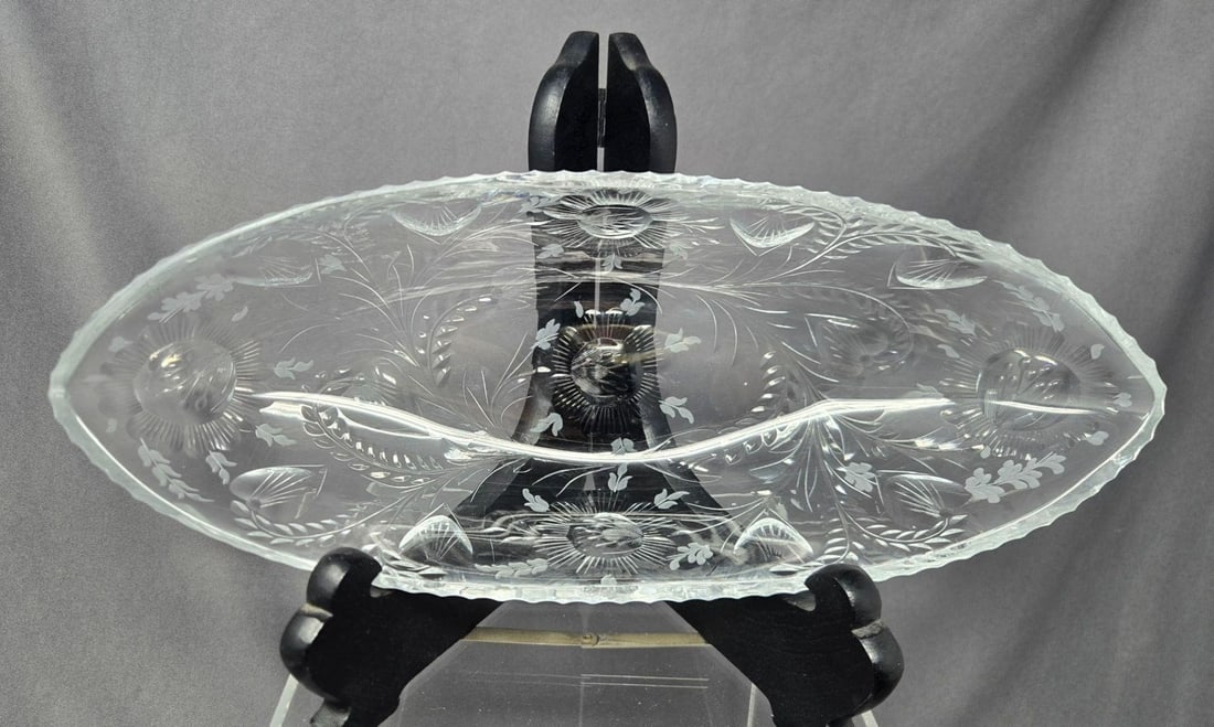 ABP Celery Dish Hearts, Ferns, Flowers 11 1/2: Spectacular antique American Brilliant Period cut glass celery dish. It has heart shaped leaves on fern like stems and flowers with stamens in the center. It has a 1/2 cut round cut on edge. Circa ear