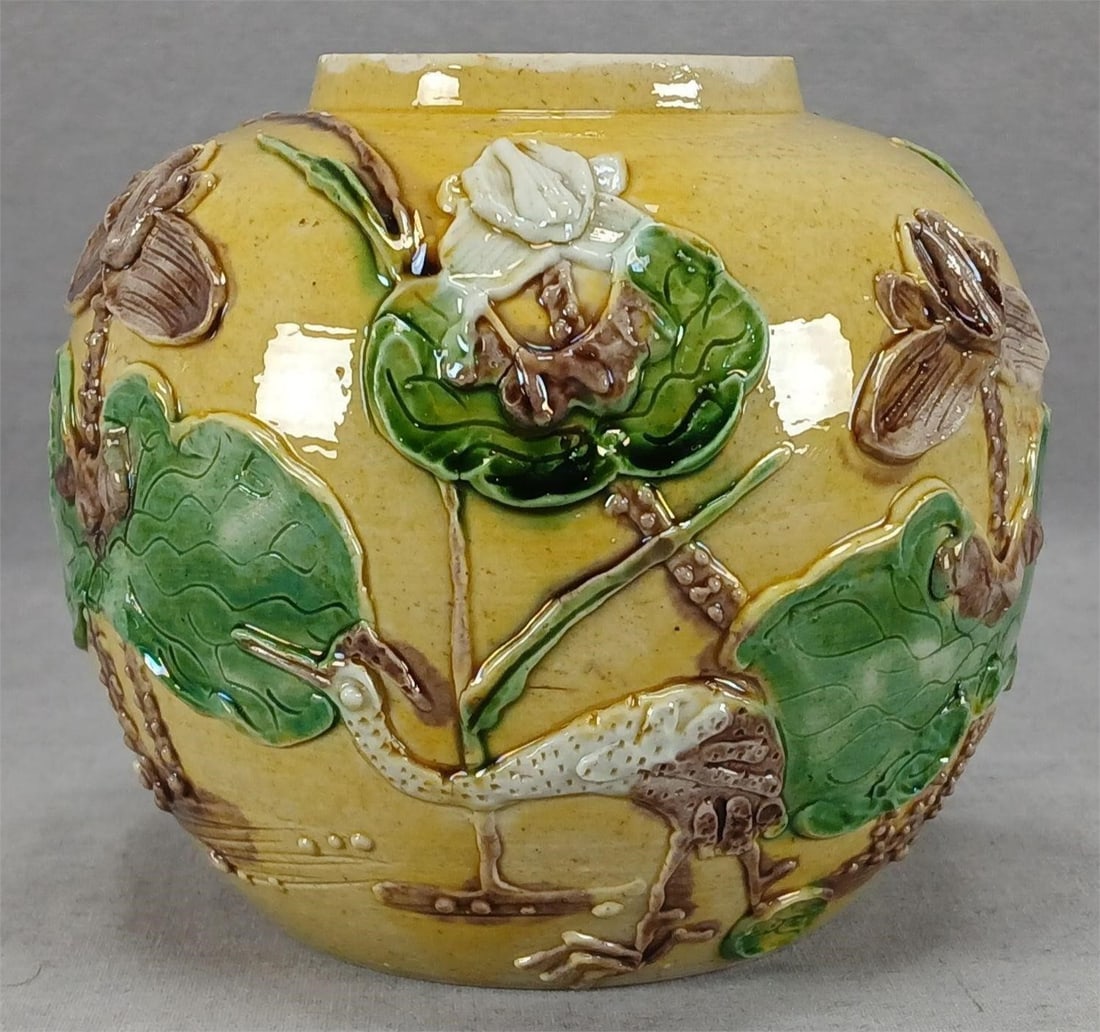 Chinese Wang Bing Rong Cranes Lotus Ginger Jar: Antique 19th century Chinese porcelain ginger jar missing the lid. Wang Bing Rong type with white relief crane and lotus pond over a yellow ground. Unmarked. The jar is missing the lid, has a few smal