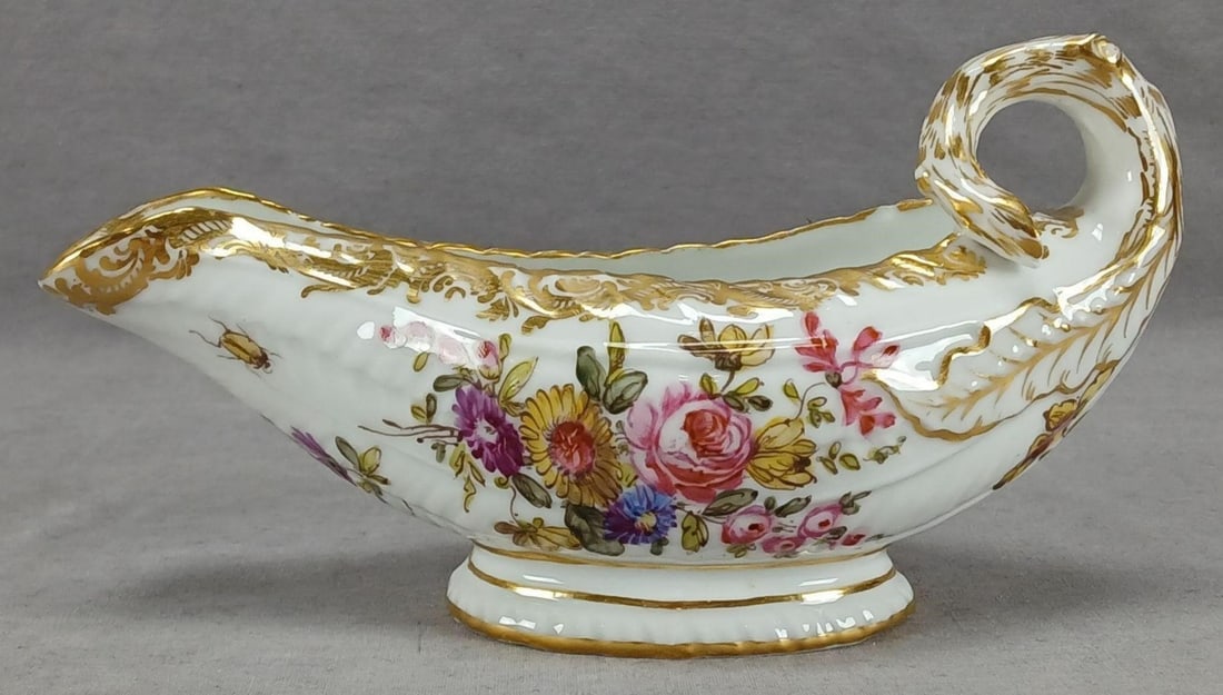 Eugene Clauss / Bourdois & Bloch Paris Sauce Boat: Antique 19th century century Paris porcelain sauce / gravy boat. Decorated with hand painted flowers in pink, yellow, purple, and blue. With gold highlights to the handle and gold scrollwork along the