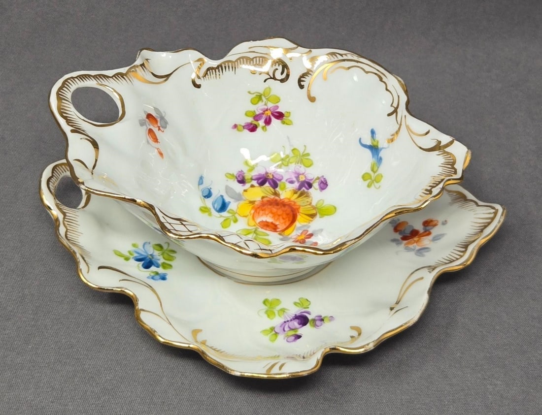 RL Dresden Ahrenfeldt Gravy Boat & Undertray: Marked RL Dresden, Ahrenfeldt porcelain individual sauce or gravy boat and undertray. Hand painted flowers and gold gilt design. Approximate measurements: The saucer is 6 inches by 5 1/2 inches. the b