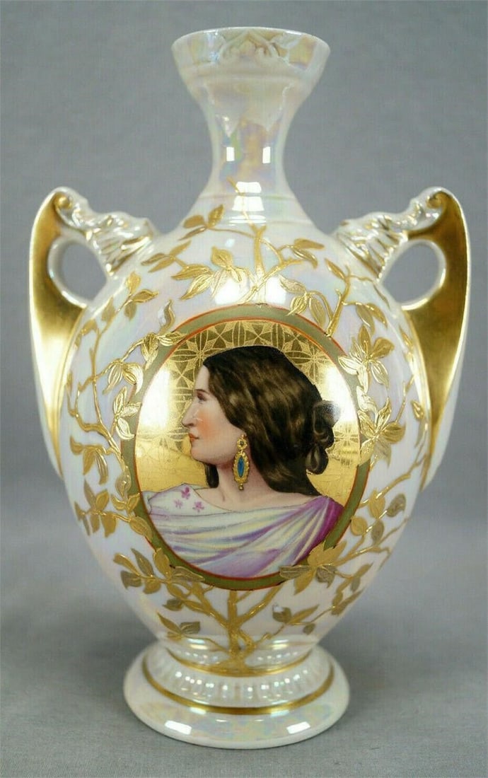 Heubach Royal Litche Iris Lady Portrait Vase: Nice Royal Litche porcelain vase with a portrait of a brunette lady over a gold background with raised gold leaves and an iridescent background. Marked on the bottom with a blue rising sun above Iris