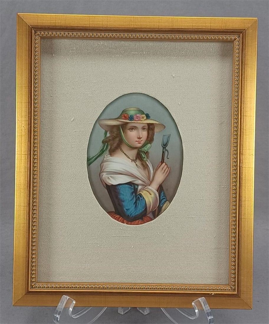 Antique Hand Painted Girl Porcelain Portrait: Nice antique porcelain plaque with a hand painted portrait of a Georgian peasant girl. The plaque is probably late 19th century or early 20th century German. It is set into a modern gilt with beige fa