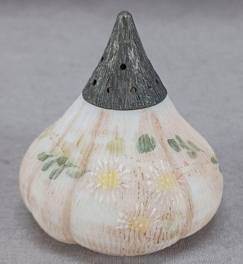 Mt Washington Beet / Fig Shape Daisies Shaker: Antique Mt Washington beet / fig shape shaker. Decorated with hand enameled white daisy flowers over a white and beige glass. Has a metal lid. Unsigned. Circa 1893 to 1894Has some wear and tarnish to