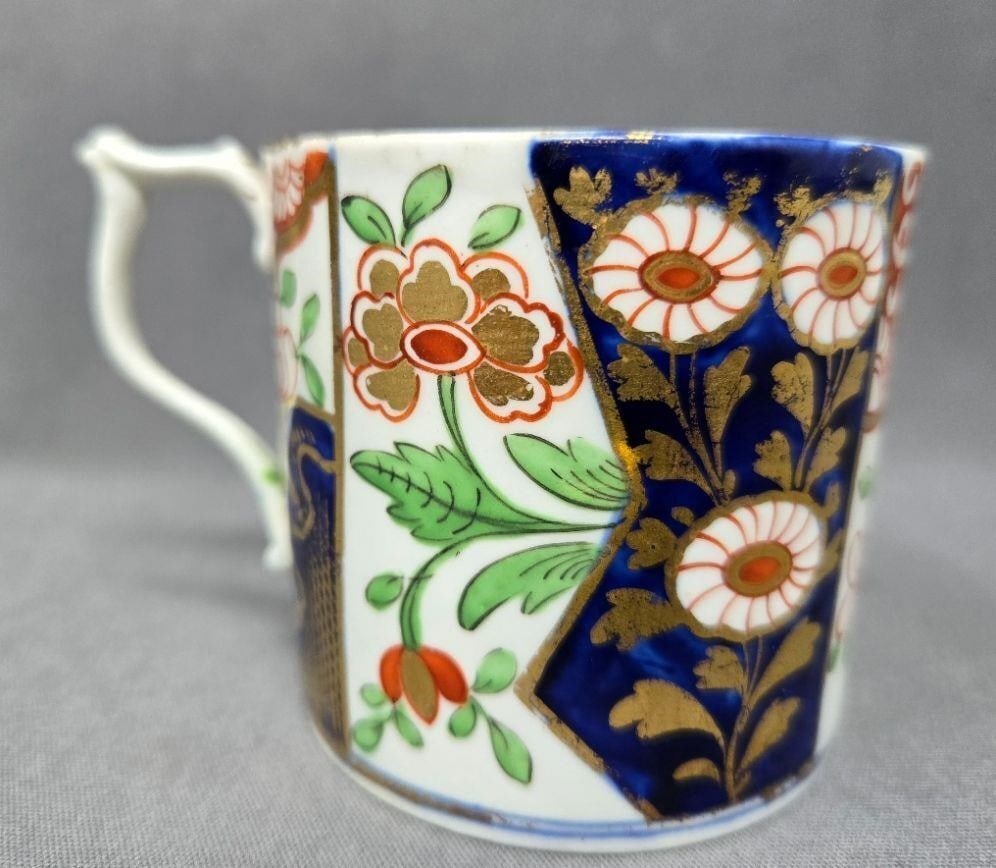 Old Derby Coffee Can Imari Pattern C. 1820: Antique Derby Imari pattern coffee can. Some wear to gold gilt, but no chips or cracks. Measures approximately 2 1/2 inches tall and 2 5/8 inches in diameter. C. 1820. We can offer packaging and shipp