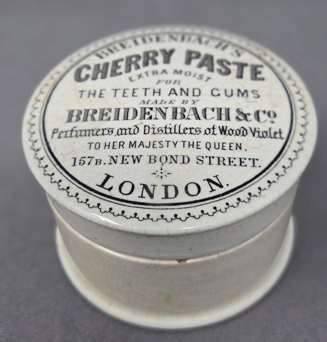 Breidenbach's Cherry Paste Pot Lid with Base: Breidenbach's Cherry Paste pot lid with base. London England. Circa 1860s. Cherry Paste Extra Moist for the Teeth and Gums Breidenbach's & Co Perfumers and Distillers of Wood Violet To her Majesty the