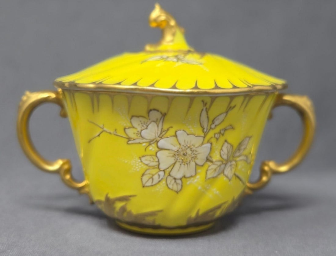 Royal Crown Derby Billion with Lid Yellow: Royal Crown Derby Yellow Bullion Cup with lid. Raised design with wild roses and small white stems. Pattern number is 3878. There is a hairline crack on the lid that shows from the top. No other damag