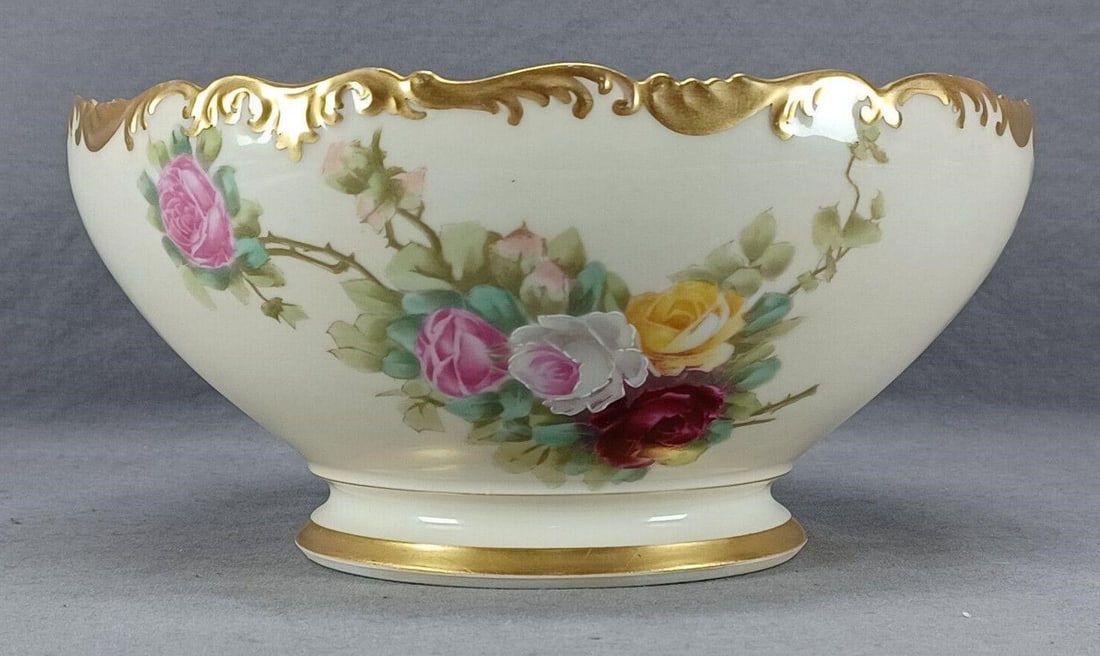 Limoges Pink & Yellow Roses & Gold 9 1/2" Bowl: Nice antique porcelain bowl. Decorated with hand colored roses in pink, dark pink, white, and yellow over an ivory background. Gold gilding along the edge. Marked on the reverse T&V Limoges France Dep