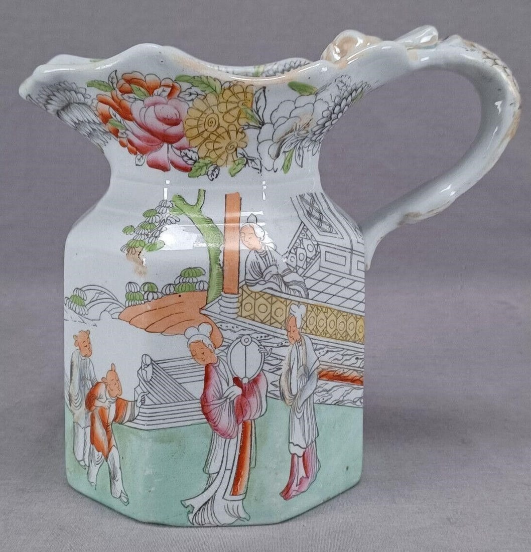 Masons Ironstone Chinese Fan Pattern 6 3/4" Jug: Nice antique Masons ironstone jug. Decorated in the Chinese Fan pattern with hand colored highlights in orange, ocher, green, and pink. Marked on the bottom Mason's Patent Ironstone China in black. Ci