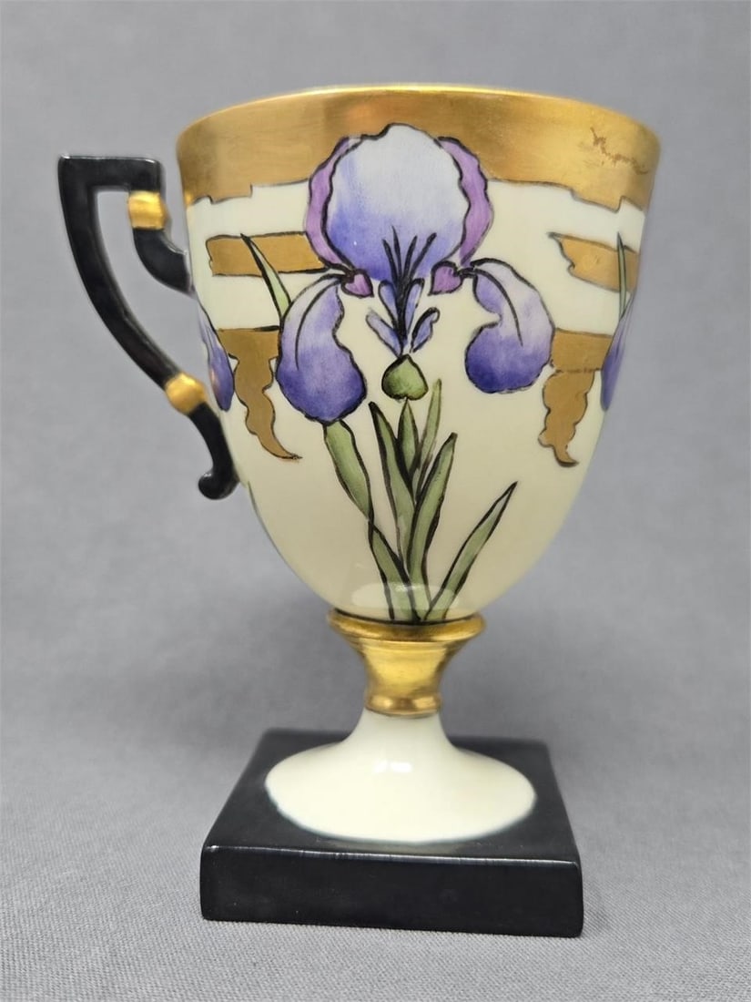 Lenox Belleek Teacup with Irises 1889-06: Unmarked Lenox Belleek teacup with square foot. Irises design with green leaves and a gold patterned background. Good condition without chips or cracks or crazing. Measures approximately 3 5/8 inches