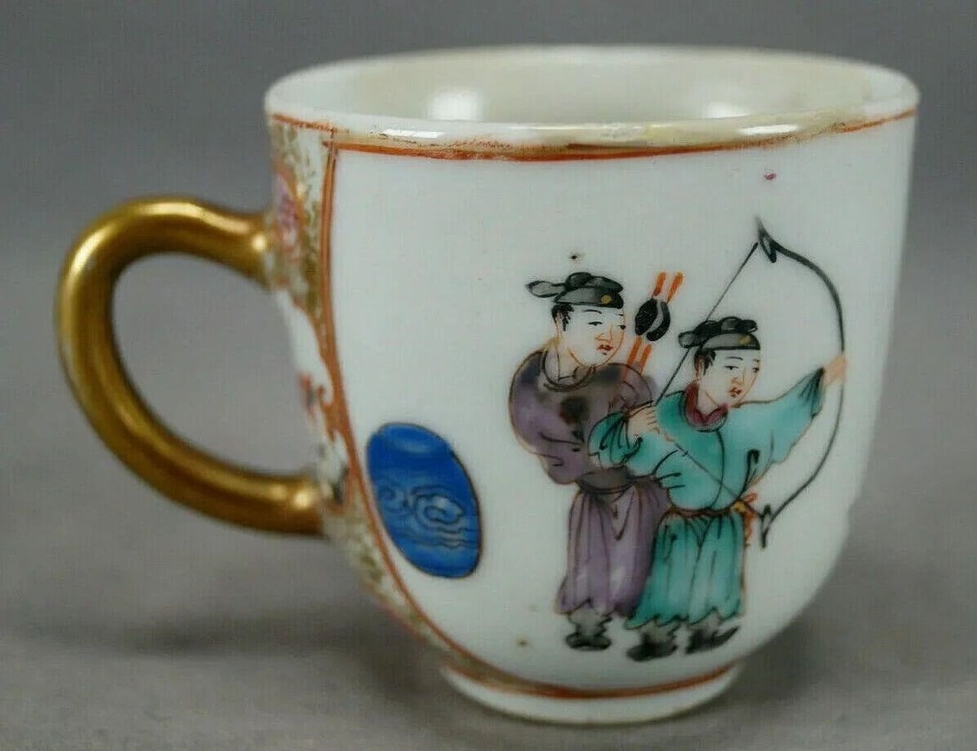 18th Century Chinese Export Archery Scene Cup: Antique 18th century Chinese Export porcelain coffee cup. Decorated with a hand painted scene depicting archery practice. Gold gilt and puce floral designs around the handle with a small red bird in t