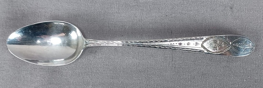 John Power Dublin Sterling Silver Spoon 1788-1815: Antique Irish sterling silver spoon. Bright-cut design to the handle and engraved MWE on the top of the handle. Hallmarks for John Power, Dublin, circa 1788 to 1815, and sterling.Has some wear and tar
