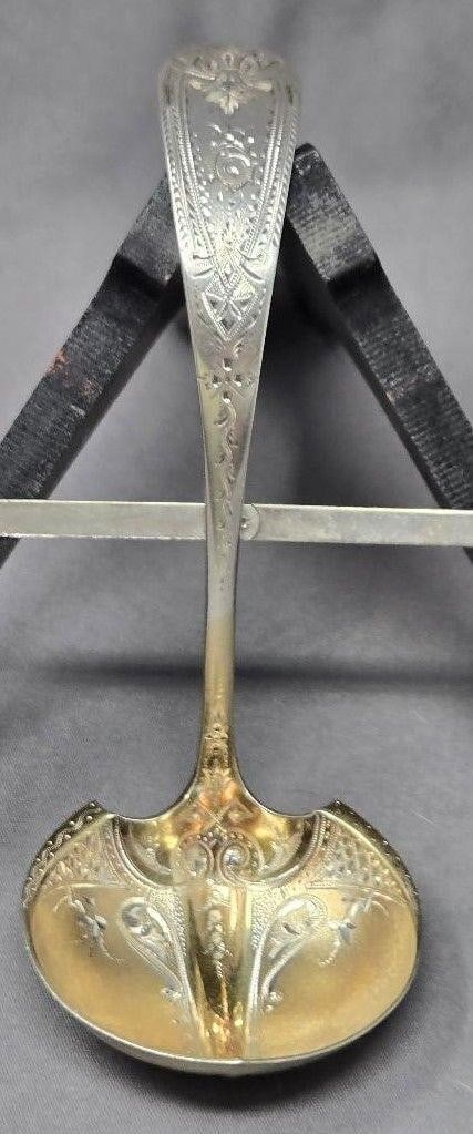 Bailey & Co. Bright Cut Sterling Silver Ladle: Sterling silver ladle made by Bailey & Company of Philadelphia. It has very ornate bright cut decoration and the bowl is gold washed (both sides). There is a fancy G on the handle and the back of the