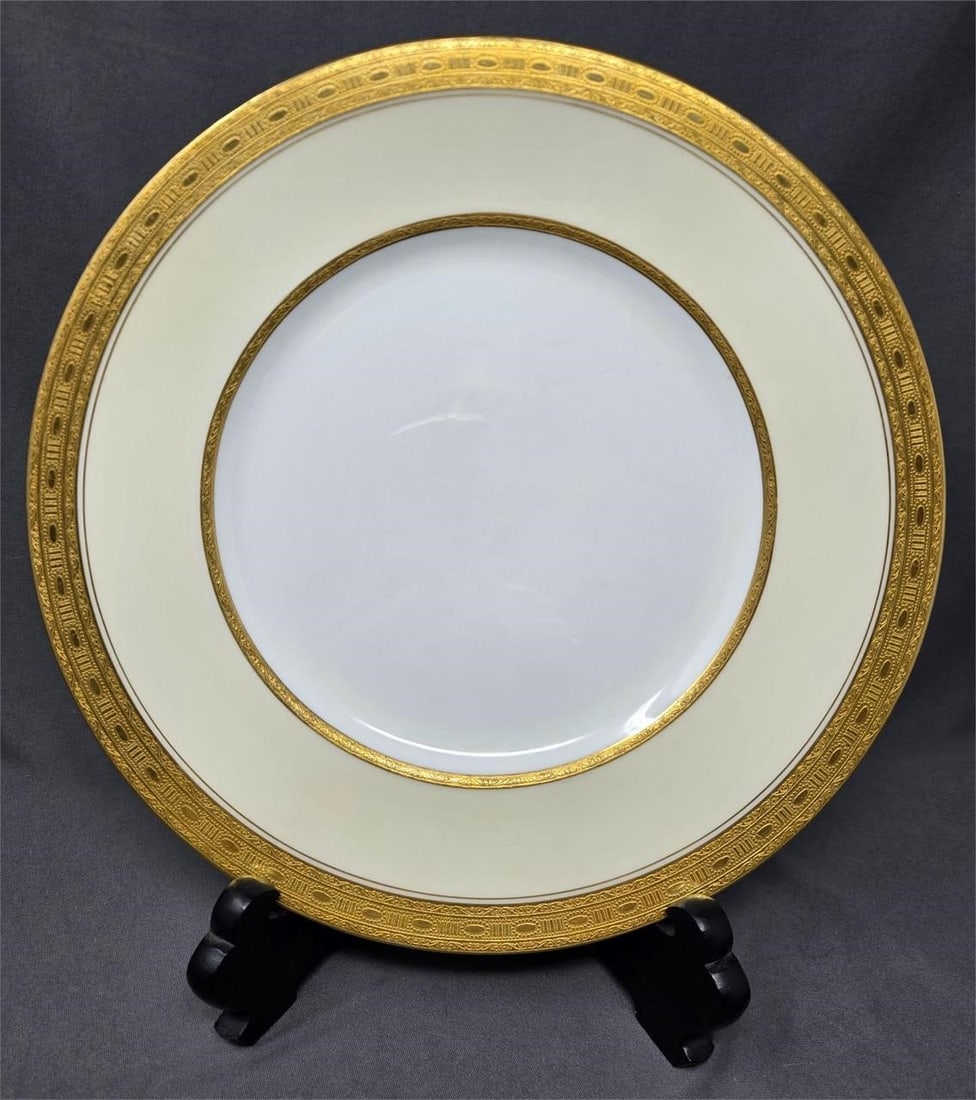 Minton for Tiffany Dinner Plate Pattern H3774: Minton for Tiffany pattern H 3774 gold encrusted rim dinner plate. Measures approximately 10 1/4 inches in diameter. No chips or cracks or crazing, only minor scratches from use. White center with thi