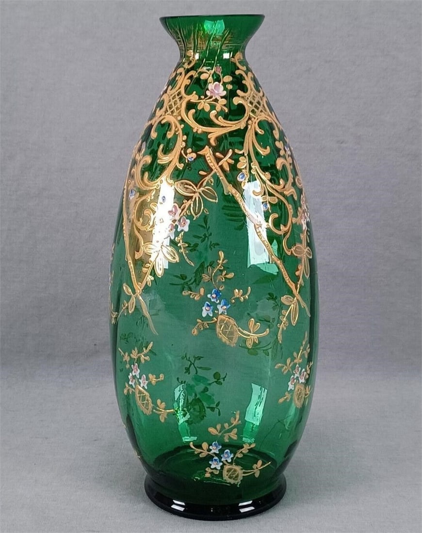 Bohemian Enameled Floral & Gold Green Glass Vase: Antique late 19th century Victorian era Bohemian optic molded green glass vase. With hand enameled pink and blue flowers and orange and gold scrollwork and lattice designs. Unsigned. Circa 1870 to 190