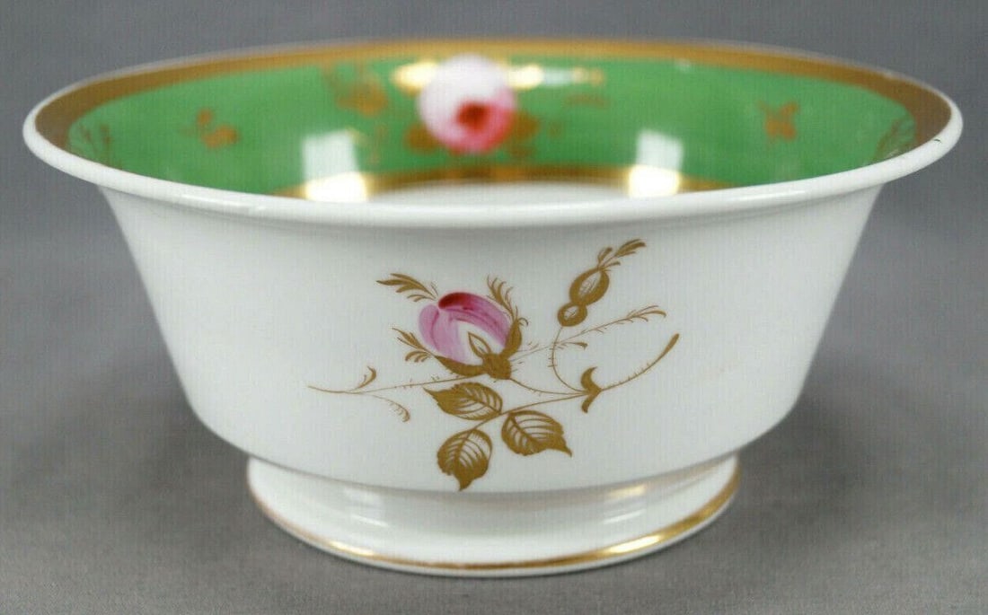 19th Cent British 371 Hand Porcelain Waste Bowl: Very nice mid 19th century British bone china / porcelain waste bowl. Decorated with nicely hand painted flowers in yellow, orange, white and purple in the center of the bowl. Has a green and gold bor