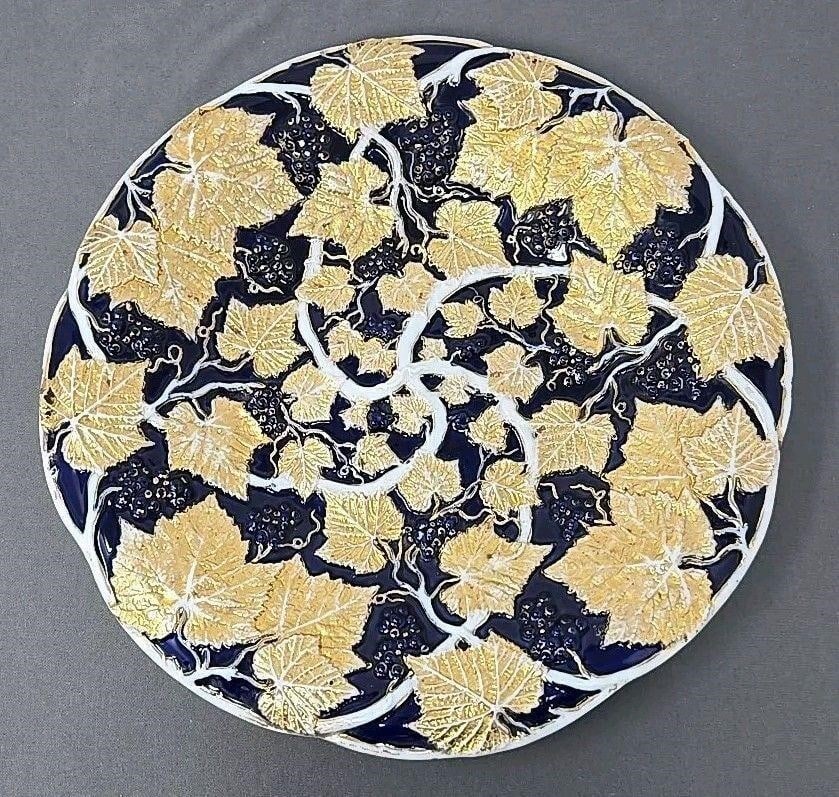Meissen Cobalt Grapevine 11 3/4 Inch Shallow Bowl: Meissen grape vine with grapes, cobalt blue with gold and white shallow dish / centerpiece bowl. Circa 1850s. Very good condition without chips or cracks or scratches. loss of gold on edges and some o