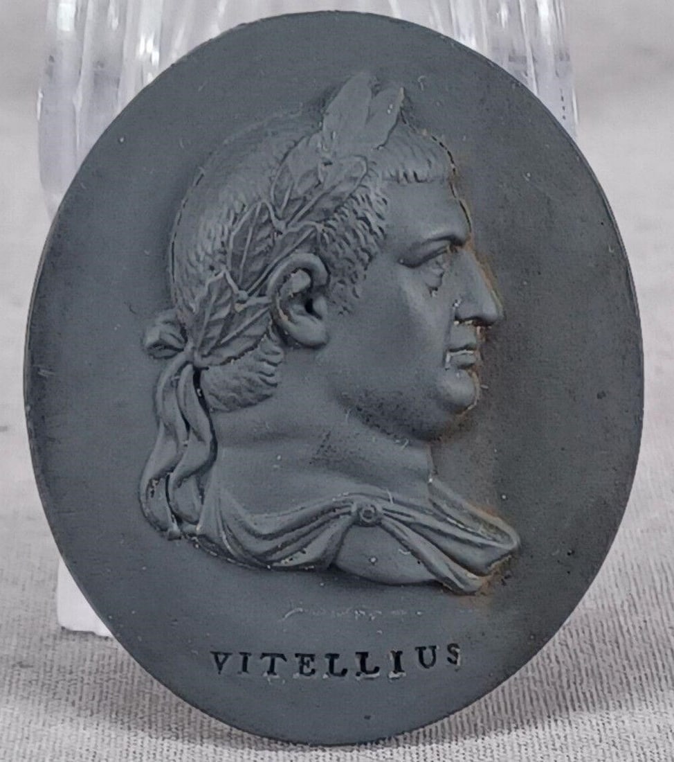Wedgwood Vitellius Black Basalt Plaque 1780-95: Rare antique British black basalt portrait medallion of the Roman Emperor Aulus Vitellius. Impressed Vitellius below the portrait. Also impressed Wedgwood on the reverse. Circa 1780 to 1795.Has a very