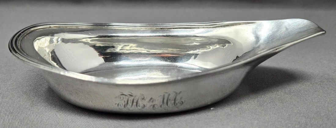 Georgian Silver Pap Boat Elizabeth Morley - c.1810: Georgian silver pap boat / invalid feeder. It was made by Elizabeth Morley in 1810. She operated between 1795 and 1814. There is an inscription on the side; "TH to MA". it measures approximately 5 3/8