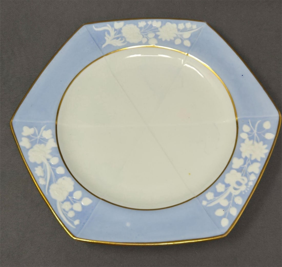 Spode Embossed Flowers Hexagonal Plate C. 1820s: Spode shallow hexagonal plate. Embossed white flowers on a light blue rim outlined in gold gilt bands. pattern number 2036. No chips or cracks, some loss of gold, mostly on corners. There is some ligh