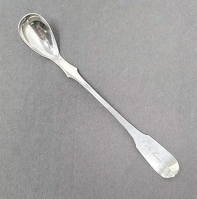 Brady & Elliott Silver Mustard Spoon Pottsville PA: Brady and Elliott coin silver mustard spoon from Pottsville Pennsylvania. Circa 1850- 1853. Measures approximately 5 1/2inches long. Scratches from use. Monogrammed.We can offer packaging and