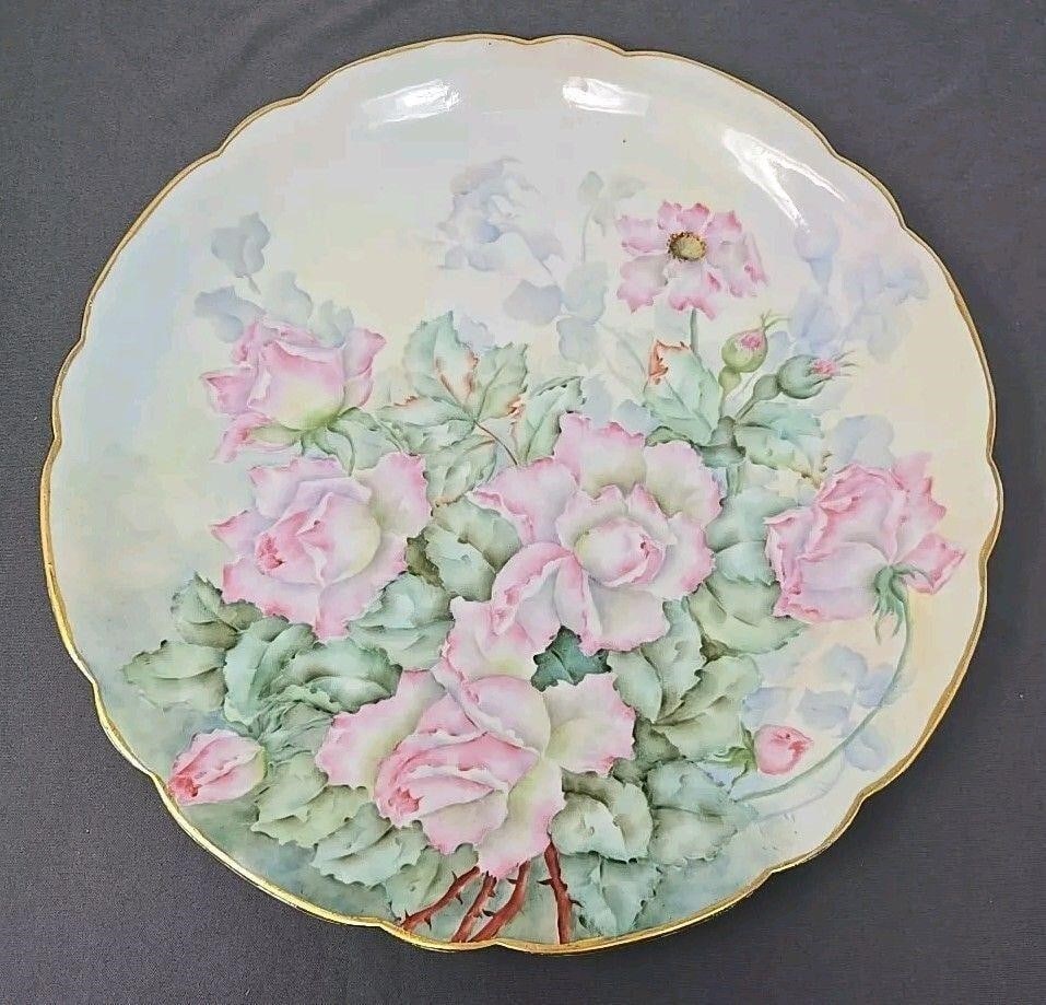 Pink Roses Jean Pouyat Limoges 12 1/2" Charger: Artist decorated Jean Pouyat Limoges charger. Measures approximately 12 1/2 inches diameter and 1 1/2 inches tall. No chips, cracks, or scratches. Light loss of gold on rim. Circa 1890 to 1932. Artist