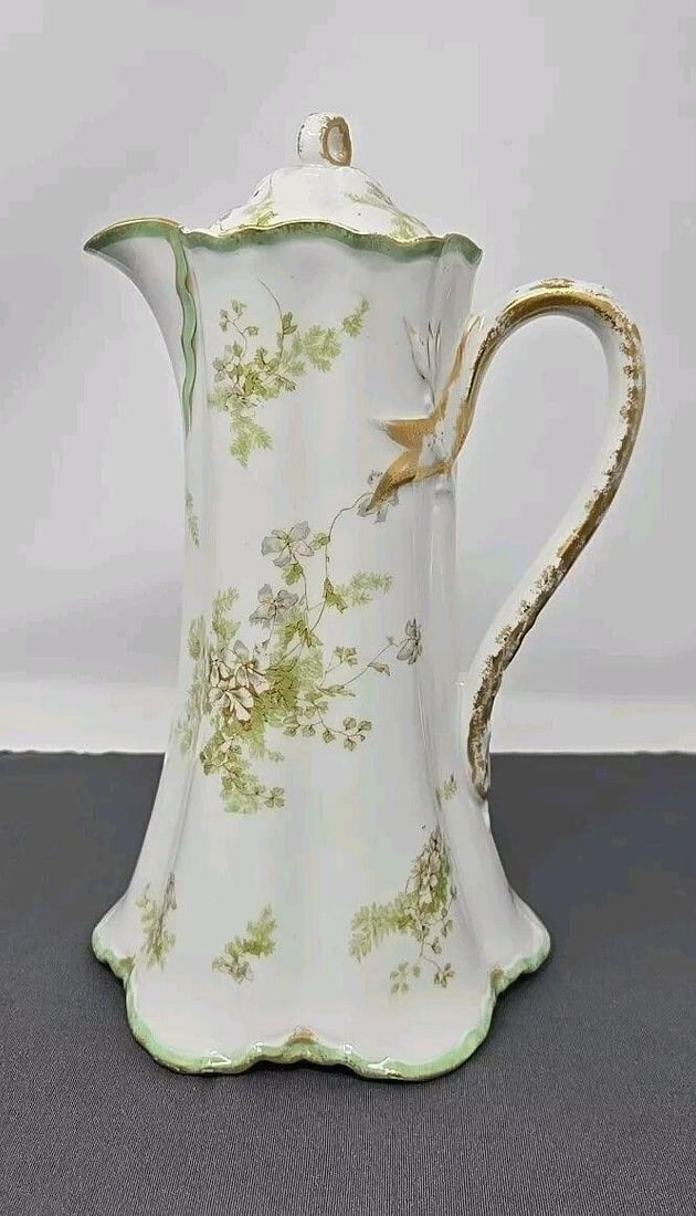 Haviland & Co. Limoges Chocolate Pot With Lid: Haviland & Co Limoges chocolate pot. Schleiger 52T, grey flowers and green ferns, light green ribbon trim with gold rims and handles. It has both a whitewater and decorator mark. Circa 1888 to 1898. N