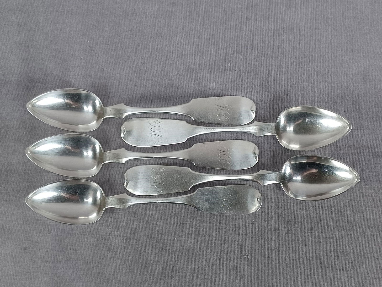 5 John Child Philada Coin Silver Spoons C1813-47: Set of 5 antique American coin silver spoons. Engraved scripted MC monogram on the front of the handle. Marked J. Child on the back of the handle for John Child, Philadelphia, circa 1813 to 1847.These