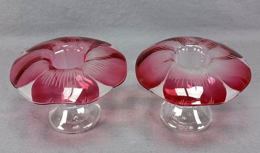 Pair of American Cranberry Molded Floral Vases: Nice pair of rare antique American mushroom form vases with optic molded clear stem. The top is cut to clear with cranberry flower petals. The clear portion of the top is left unpolished. Circa 1880s.