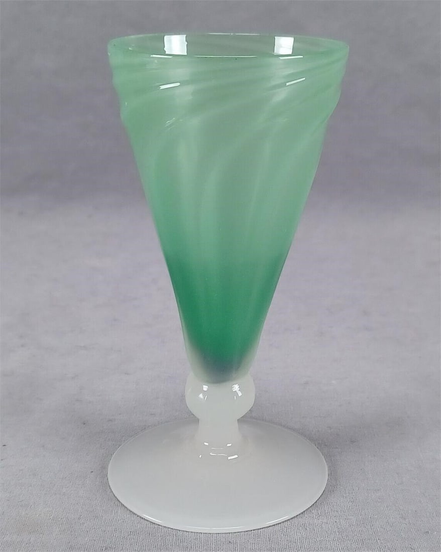 Stevens & Williams Green Alabaster Dwarf Ale Glass: Nice antique wrythen fluted dwarf ale glass in jade green and alabaster glass. Unsigned. Probably produced by Stevens & Williams. Circa 1910.Good condition. No chips or cracks.Measures approximately 2
