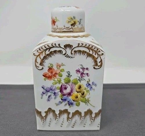 Richard Klemm Dresden Style Hand Painted Tea Caddy: Richard Klemm Dresden Style flowers tea caddy. Nice condition with molded details, colorful flowers, and gold gilt. Measures approximately 5 3/8 inches tall, 2 3/4 8nches long, and 2 inches wide. No c