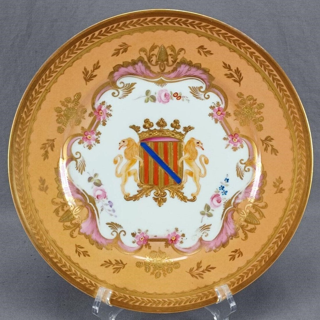 Old Paris Lions Armorial Crest 10 3/8 Inch Plate A: Nice antique Old Paris / Vieux Paris French porcelain plate. Decorated with a hand painted armorial crest in red, gold, raised gold, and cobalt blue with a raised gold crown, scrollwork, and lions. Ha