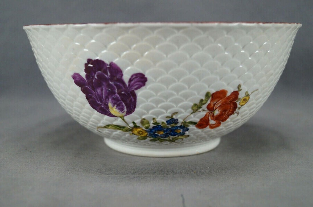 Ludwigsburg Hand Painted Floral 7 1/2" Bowl C.1760: Nice 18th century Ludwigsburg porcelain bowl with overall scale mold. Decorated on the outside of the bowl with hand painted flowers in purple, yellow, blue, and red orange. Has orange and yellow flow